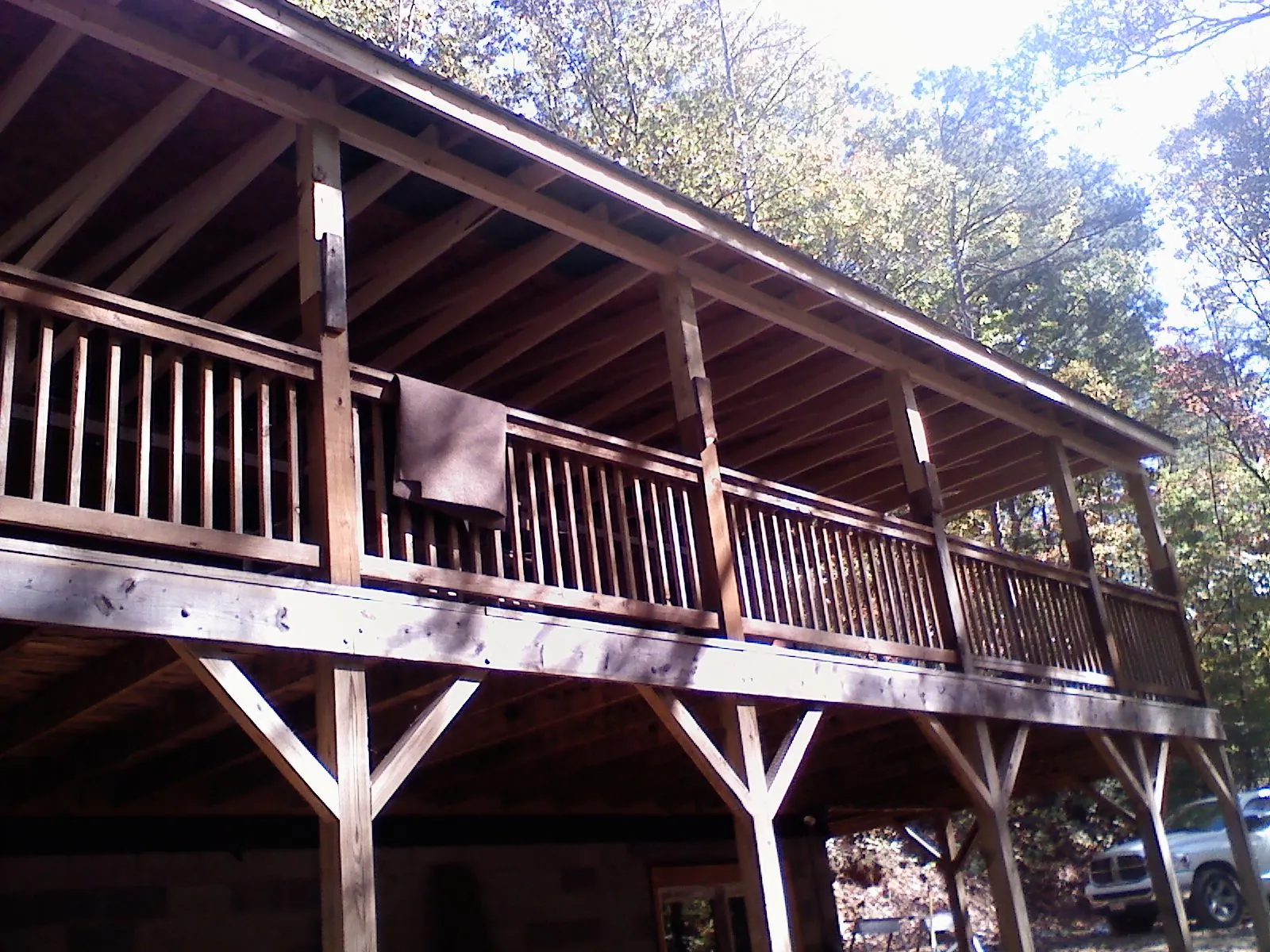 Timber framing under a new elevated porch and deck — Roof Leak Repair in Swoope by Roofing Brothers